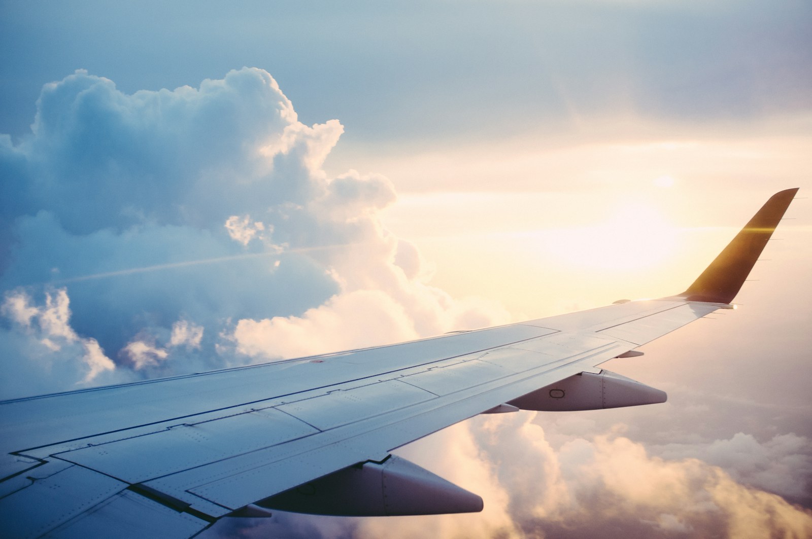 Aircraft flying above the clouds